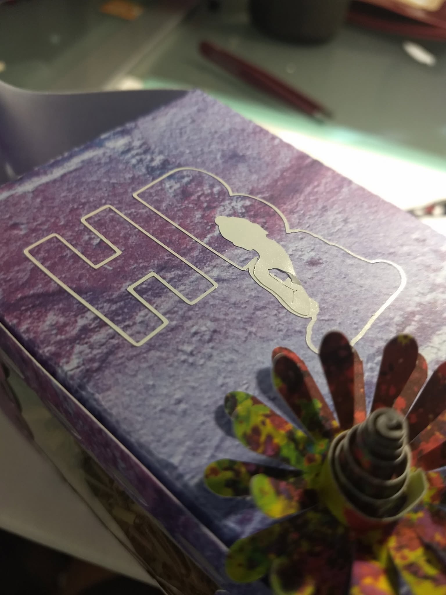 Close-up of a finished physical product and custom packaging work