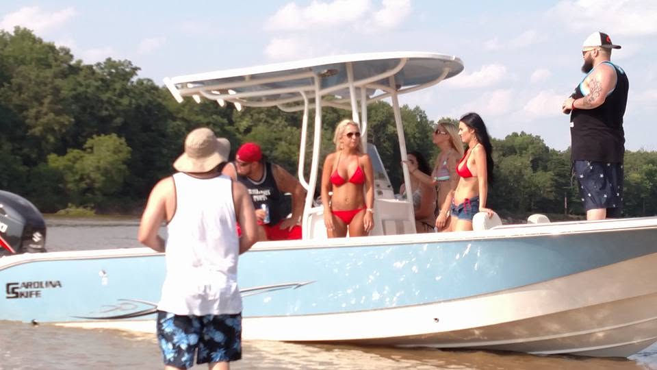 Carolina Skiff boat on the set of the Racket County Sunday music video